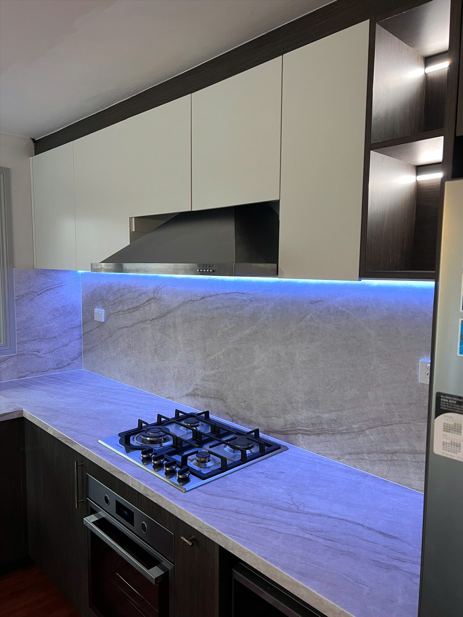 Cooktop and illuminated splashback detail